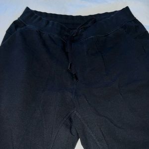 Black Lululemon joggers large. Small bleach stain.